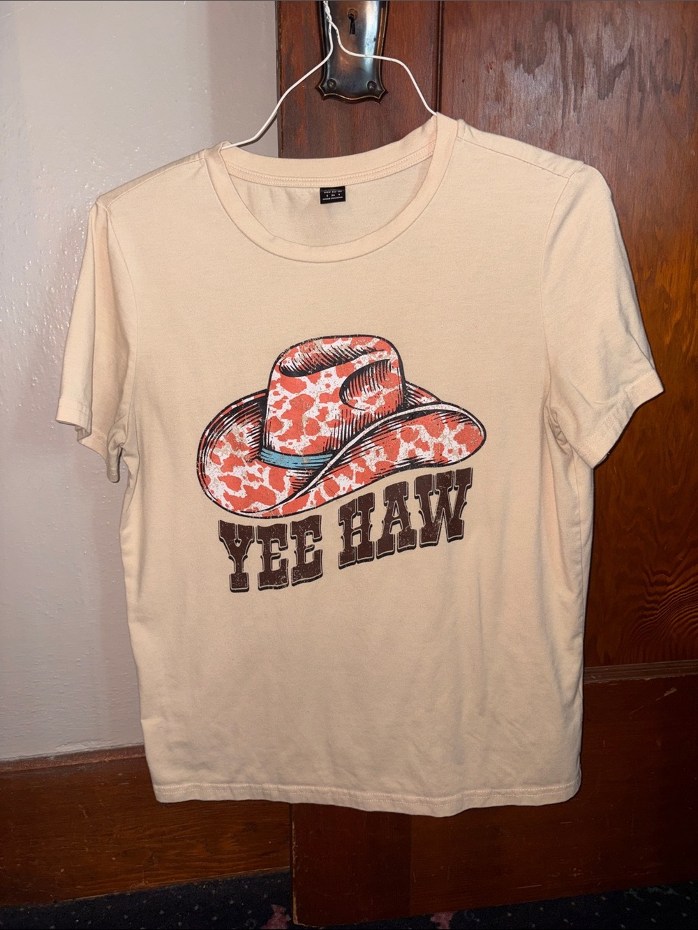 Women’s"Yee Haw" Graphic Tee - Cream with Coral Cowboy Hat